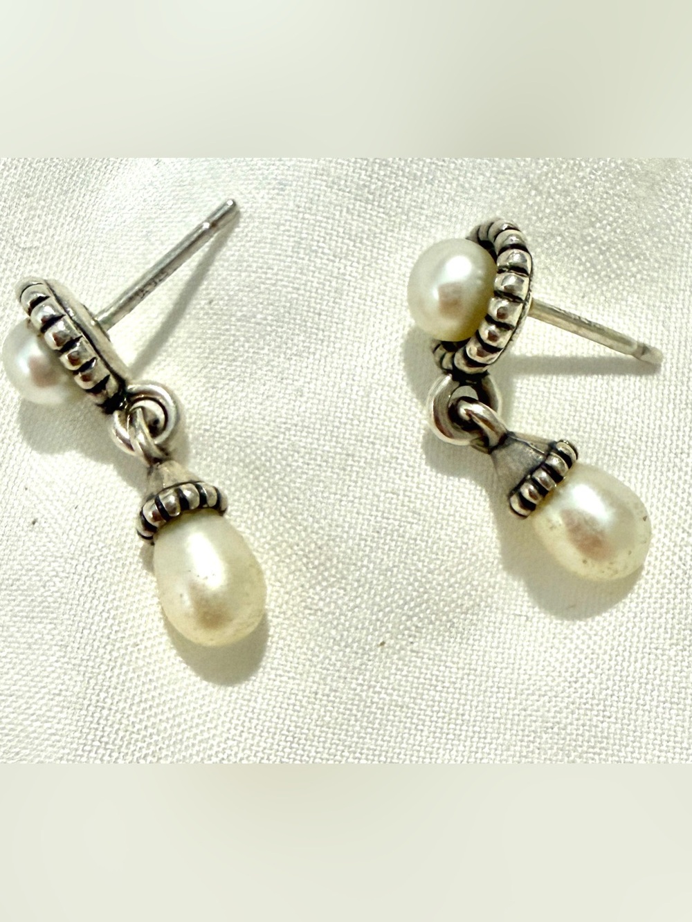 James Avery Retired sterling silver pearl earrings in a ribbed bezel setting